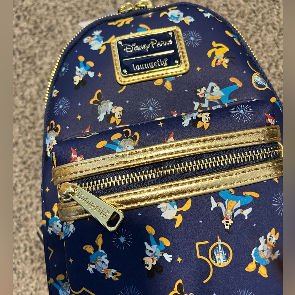 Loungefly Navy Blue & Gold Disney Parks 50th Mini Backpack new with tag